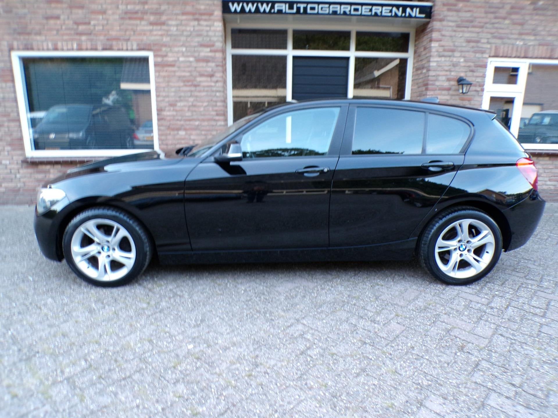BMW 1-serie 114i EDE Business, Auto's, BMW, 1-Serie, Euro 5, Gebruikt, Zwart
