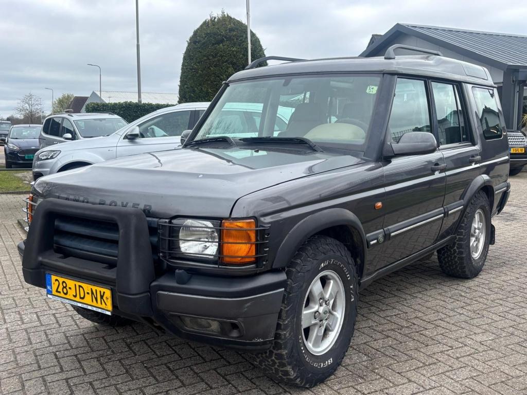 Land Rover Discovery 2.5 TD5 2002 Geel Kenteken Automaat You, Auto's, Land Rover, Gebruikt, 2495 cc, 139 pk, 7 stoelen