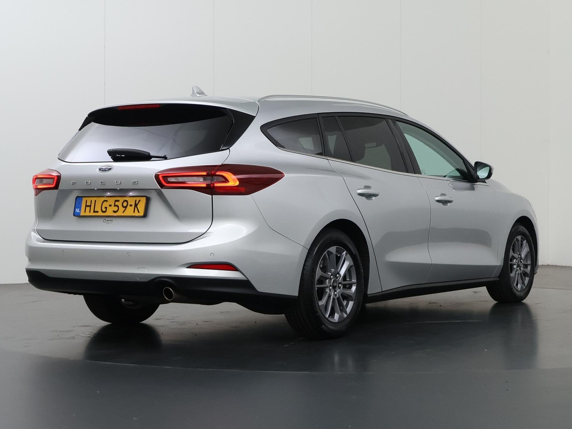 Ford Focus Wagon 1.0 EcoBoost Hybrid Titanium | Winterpakket, Auto's, Origineel Nederlands, 19 km/l, Zilver of Grijs, 999 cc