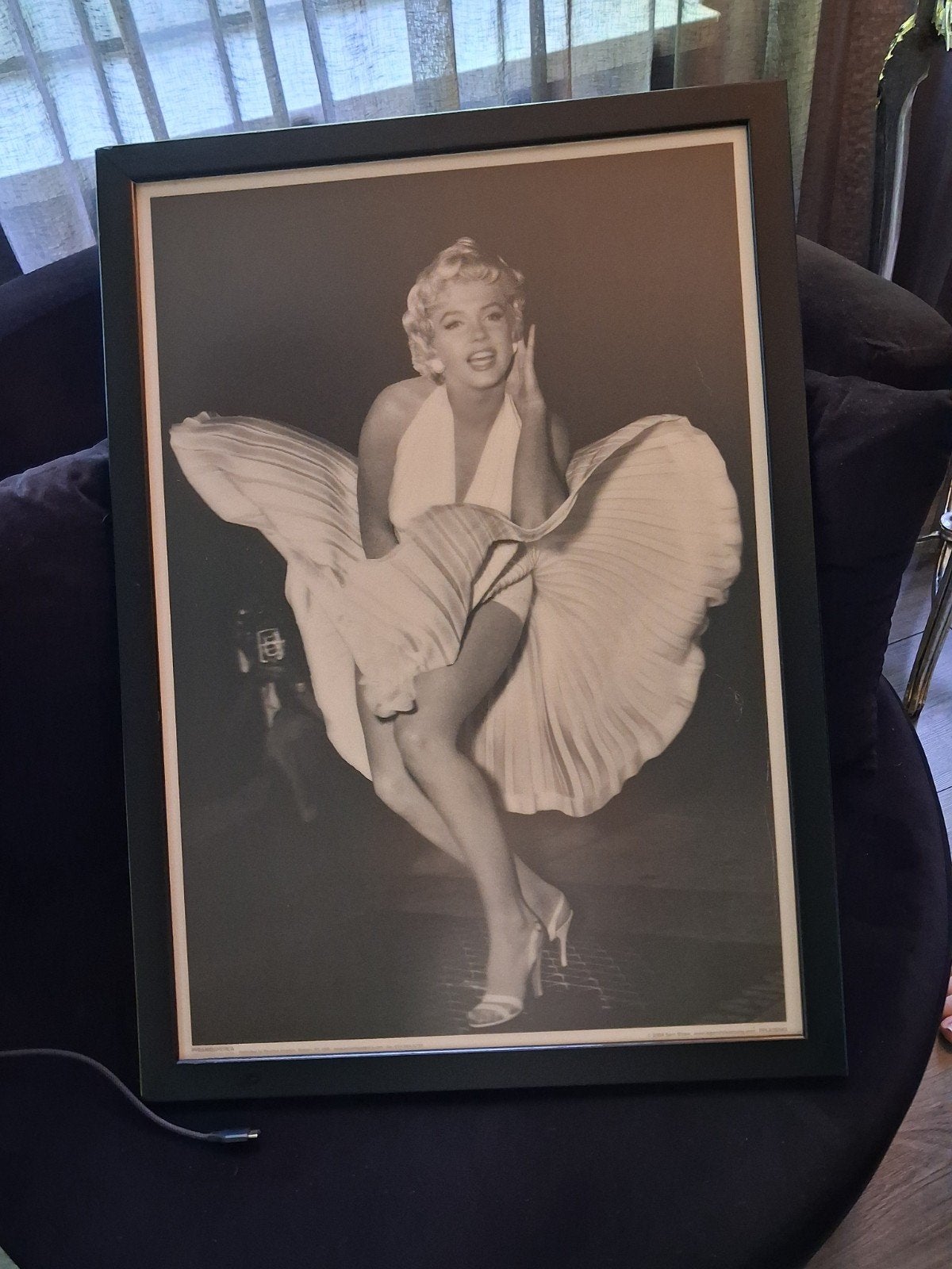 Marilyn Monroe ingelijste poster, Ophalen