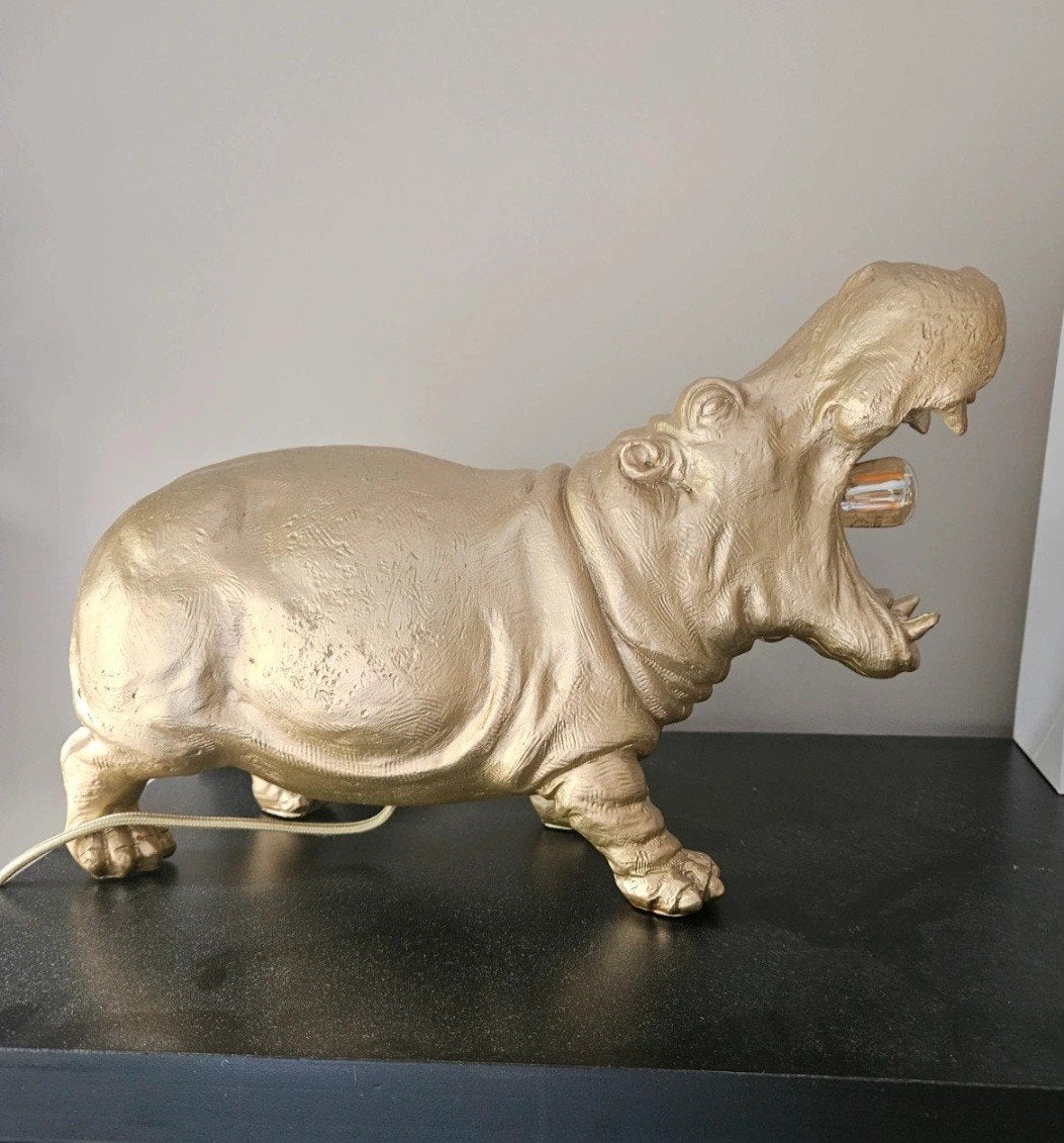 nijlpaardlamp goudkleurig, Ophalen