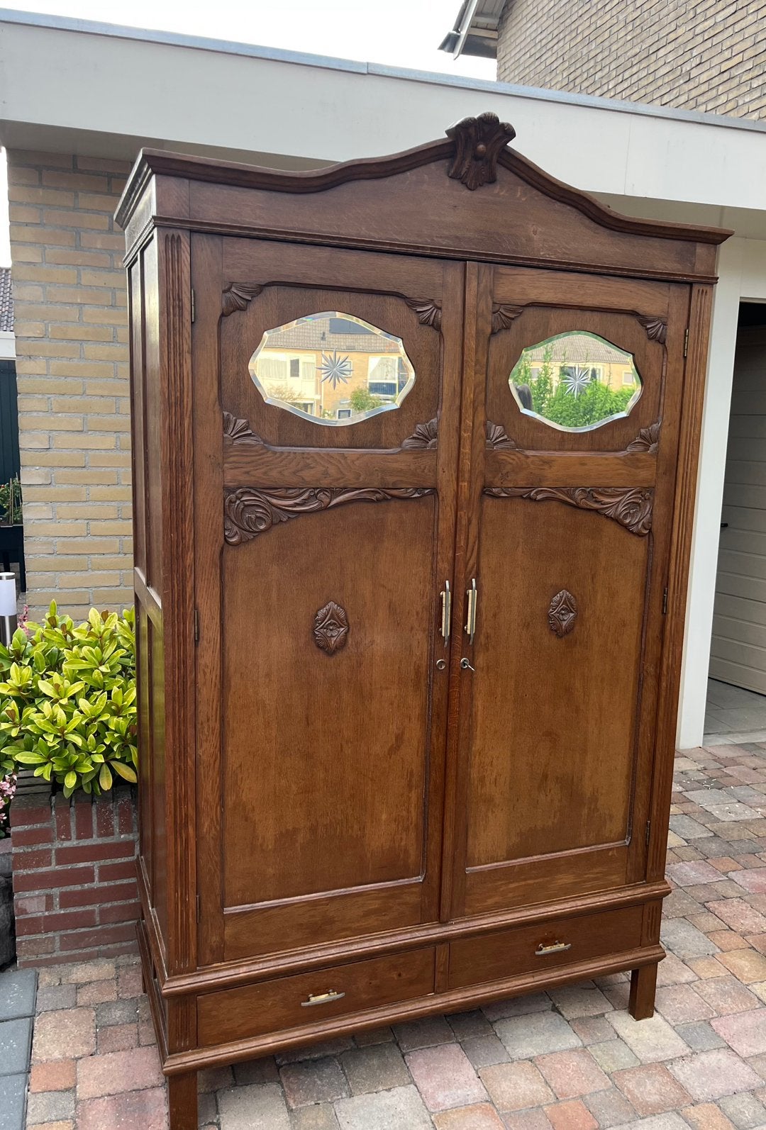 Vintage kleding kast, Ophalen