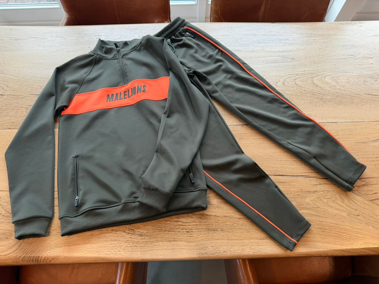 Malelions trainingspak, Ophalen of Verzenden, Zo goed als nieuw, Jongen