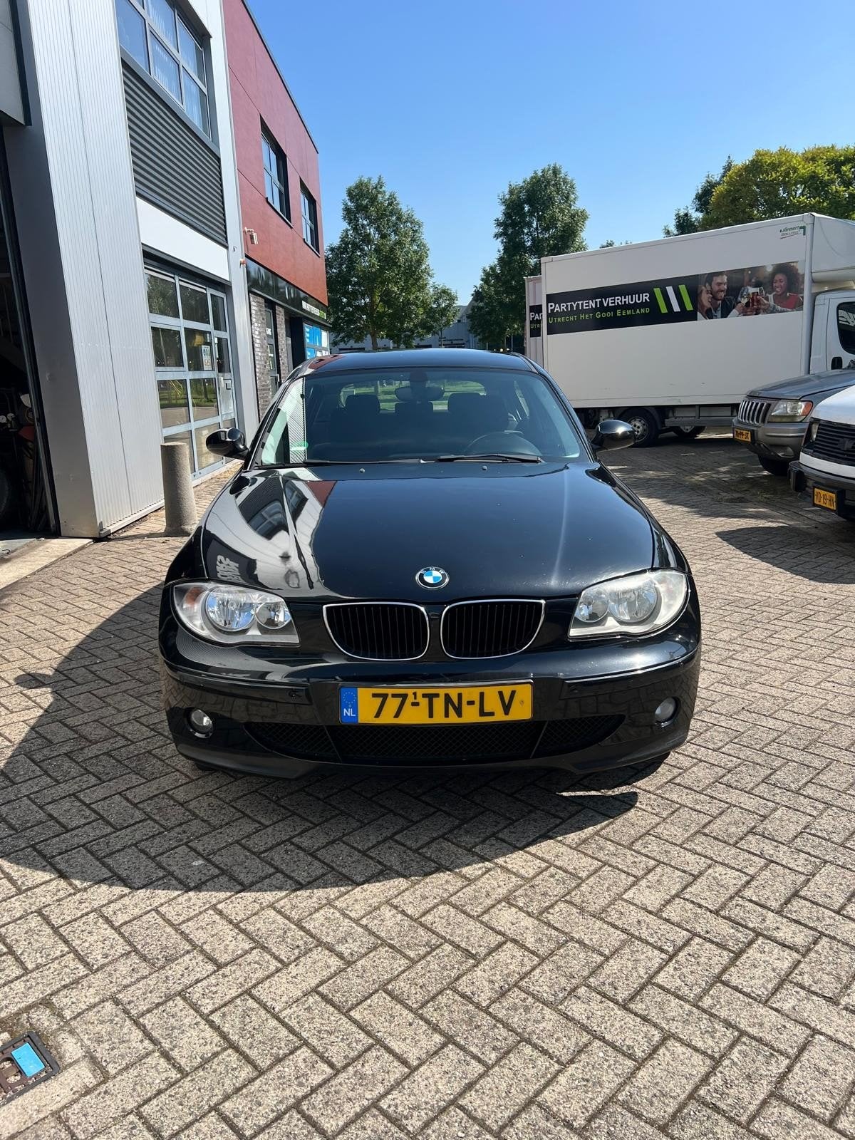BMW 1-Serie 1.6 116I 2005 Zwart. met nieuwe distributie, Auto's, BMW, 1596 cc, Achterwielaandrijving, Zwart, 4 cilinders