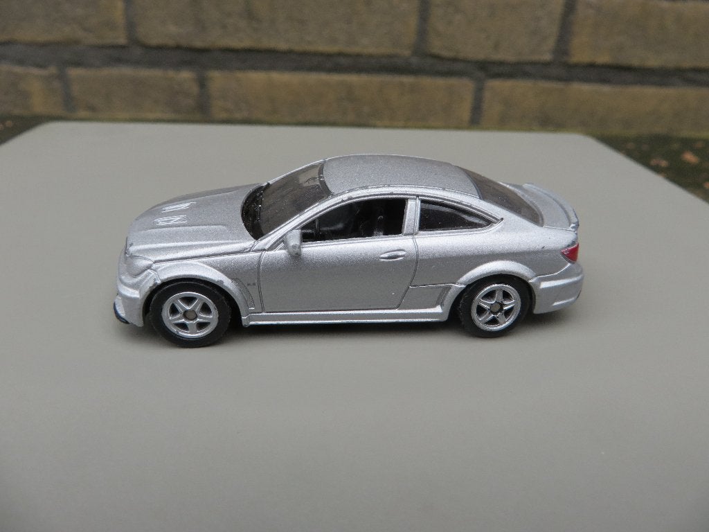 Welly Mercedes-Benz C63 AMG Coupe (W204), Hobby en Vrije tijd, Modelauto's | Overige schalen, Ophalen of Verzenden, Gebruikt, Auto