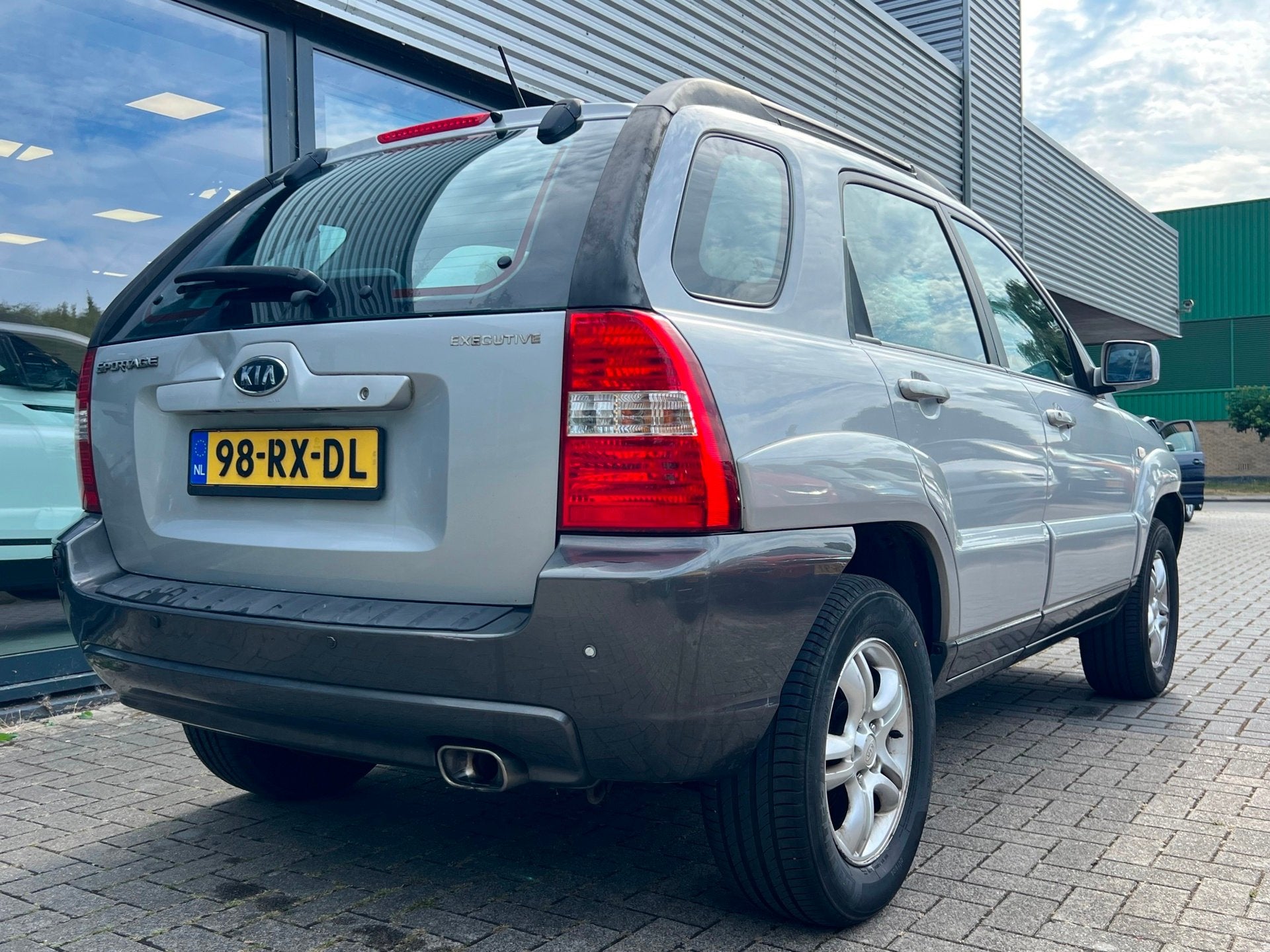 Kia Sportage 2.0 CVVT X-ecutive LPG G3 Clima / Cruise Contro, Auto's, Kia, 1486 kg, Gebruikt, Leder en Stof, Origineel Nederlands