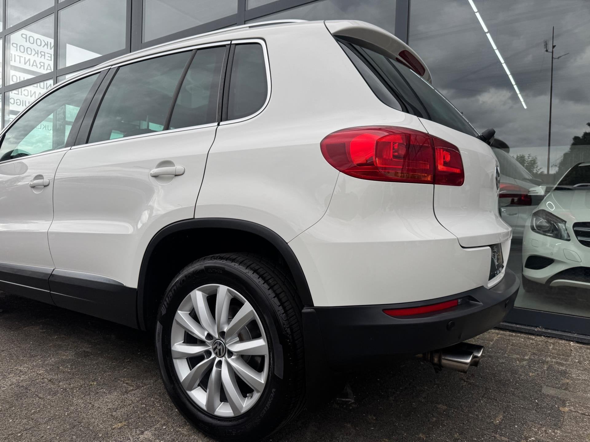 Volkswagen Tiguan 2.0 TSI Sport&Style 4Motion | Pano., Dealer onderhouden, Gebruikt, Zwart, 4 cilinders