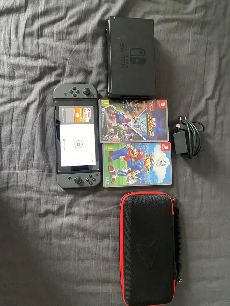 Nintendo Switch - Zo goed als nieuw met accessoires+2 games, Ophalen of Verzenden, Zo goed als nieuw, Blauw, 2DS