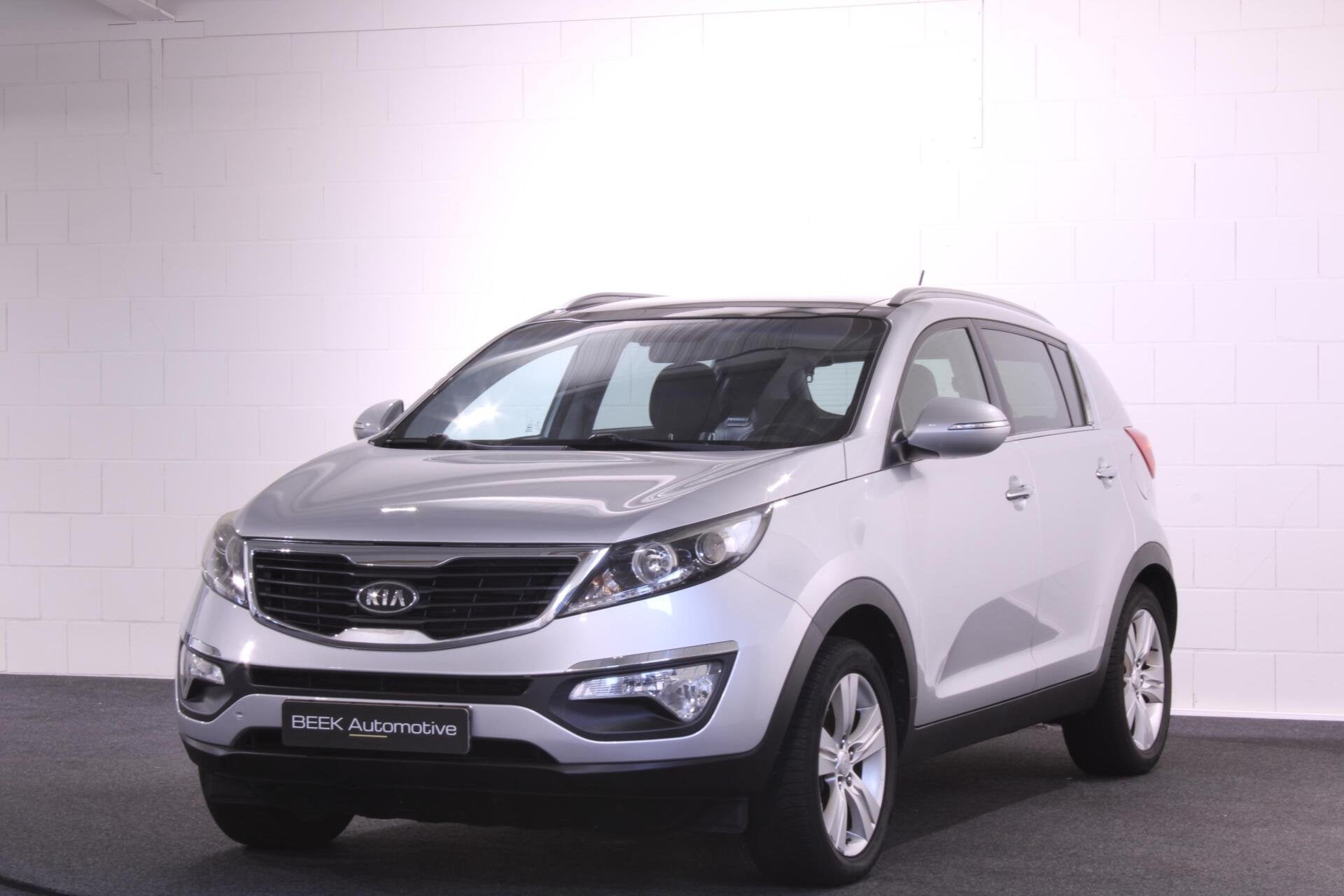 Kia Sportage 2.0 X-ecutive | Panoramadak | Trekhaak | Camera, Auto's, Gebruikt, Zwart, 4 cilinders, Met garantie (alle)