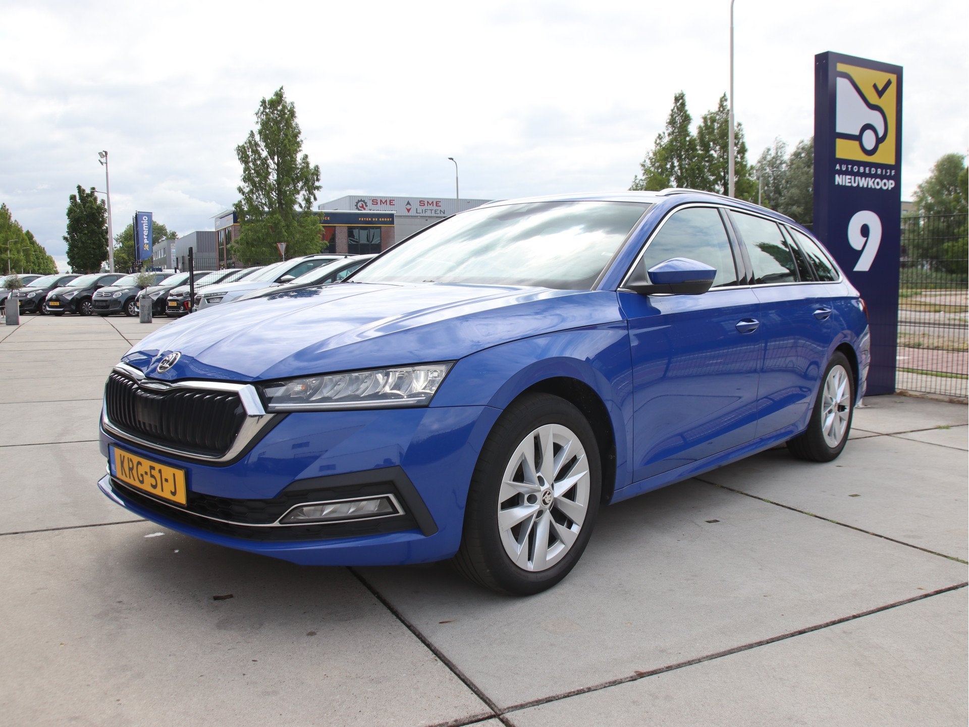 Skoda Octavia Combi 1.5 e-TSI Style Business FULL LED, Trekh, Stof, 150 pk, Blauw, Handgeschakeld