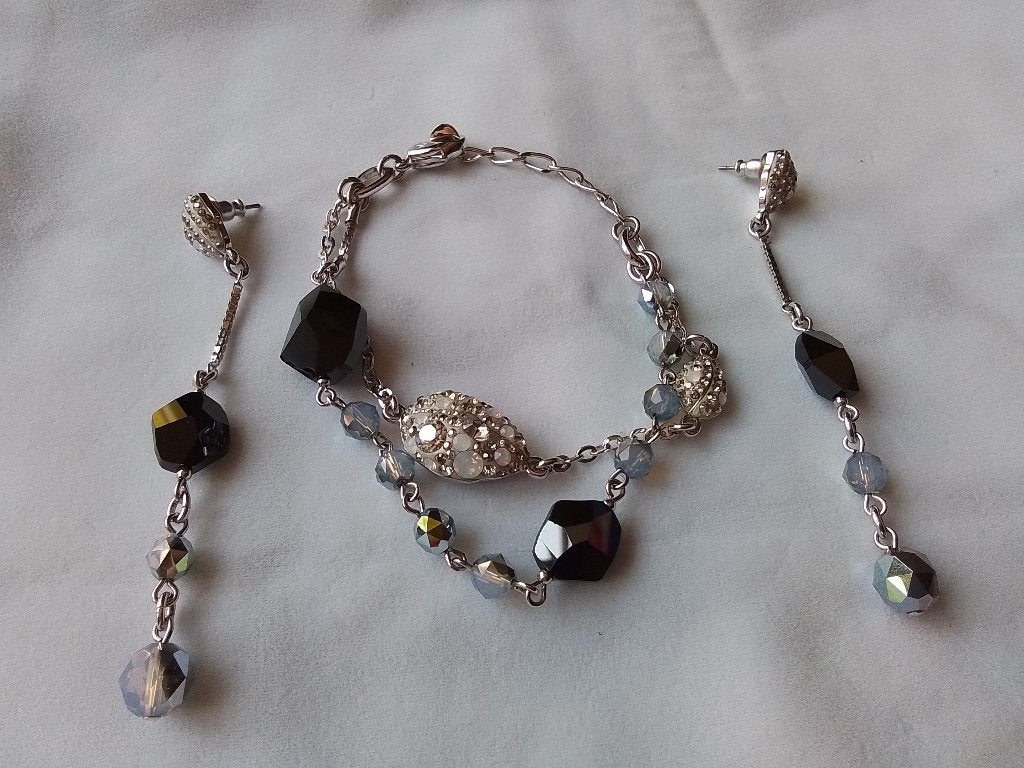 Swarovski lange oorbellen met bijpassende dubbele armband, Met kristal, Overige materialen, Ophalen of Verzenden, Zo goed als nieuw