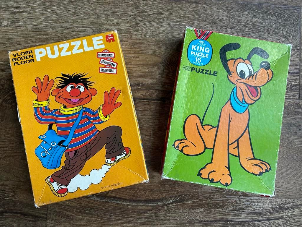 2 Vloerpuzzels 16 stukken: Sesamstraat en Pluto, Ophalen of Verzenden, 10 tot 50 stukjes, Gebruikt, 2 tot 4 jaar