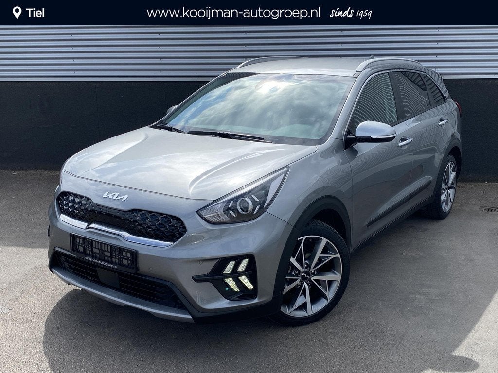 Kia Niro 1.6 GDi Hybrid DynamicLine Plus Navigatie, Achterui, Auto's, Kia, Gebruikt, Euro 6, Leder en Stof, 1390 kg