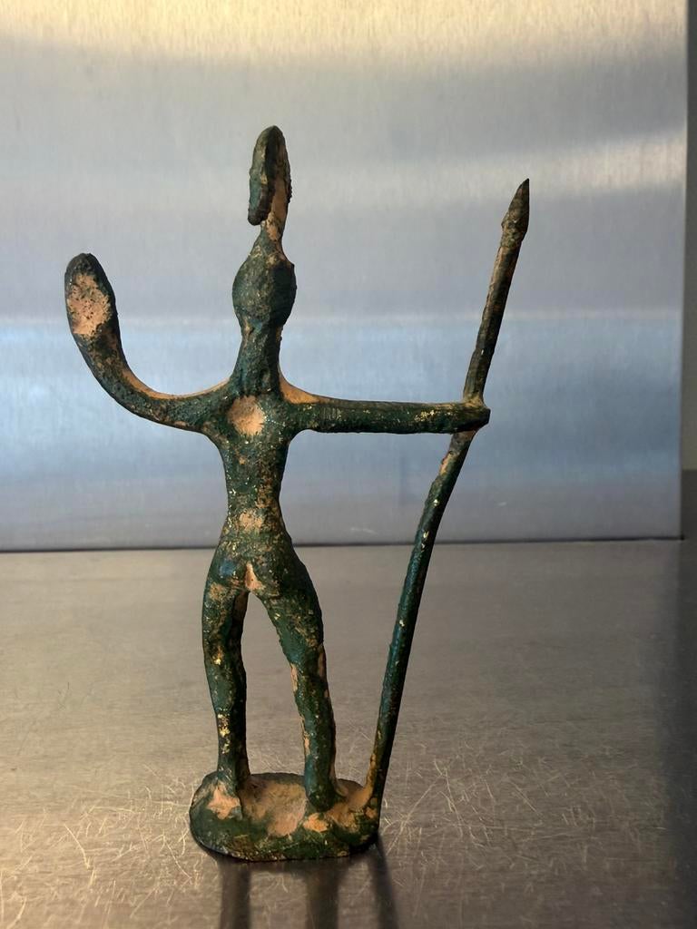 Bronzen beeldje, Ophalen
