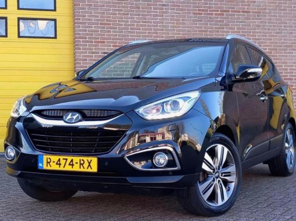 Hyundai ix35 2.0/ 4 seizoen banden/ automaat/ full option, Auto's, Hyundai, Automaat, Zwart, Zwart, Leder