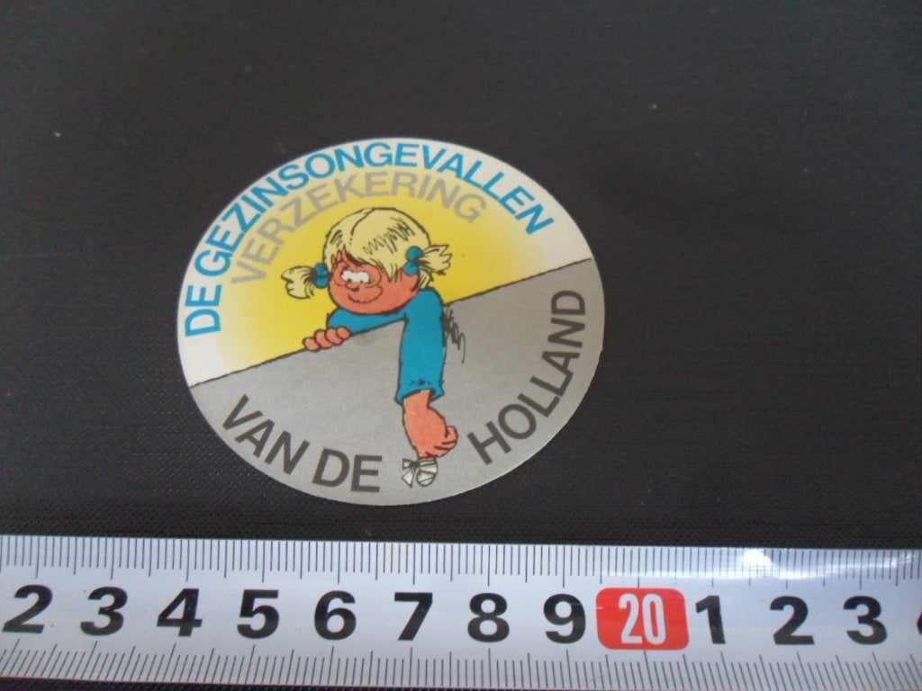 sticker De gezinsongevallen verzekerin van de Holland, Ophalen, Zo goed als nieuw