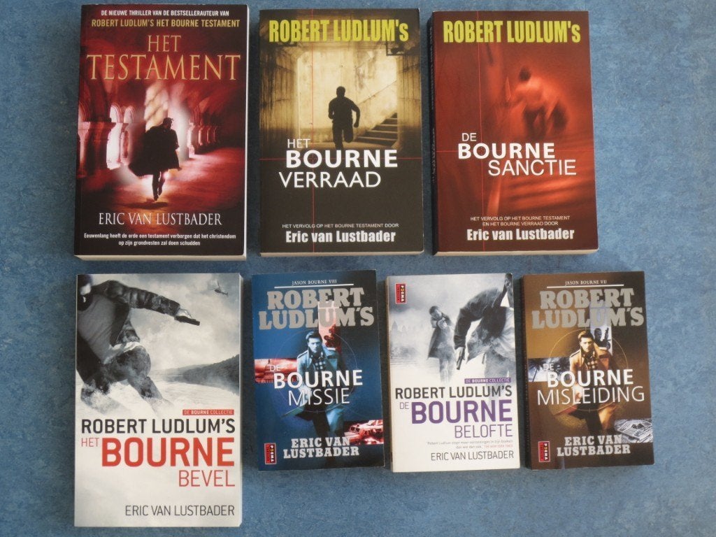 7x Robert Ludlum's - Eric Van Lustbader, Boeken, Ophalen of Verzenden, Gelezen, Robert Ludlum's - Eric Van Lustbader