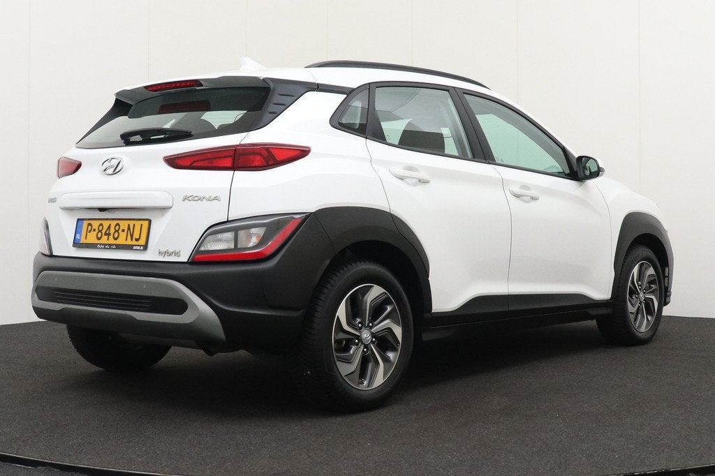 Hyundai KONA 1.6 GDI Aut. Hybrid Comfort Adapt. Cruise Clima, Auto's, Stof, Gebruikt, Wit, Origineel Nederlands
