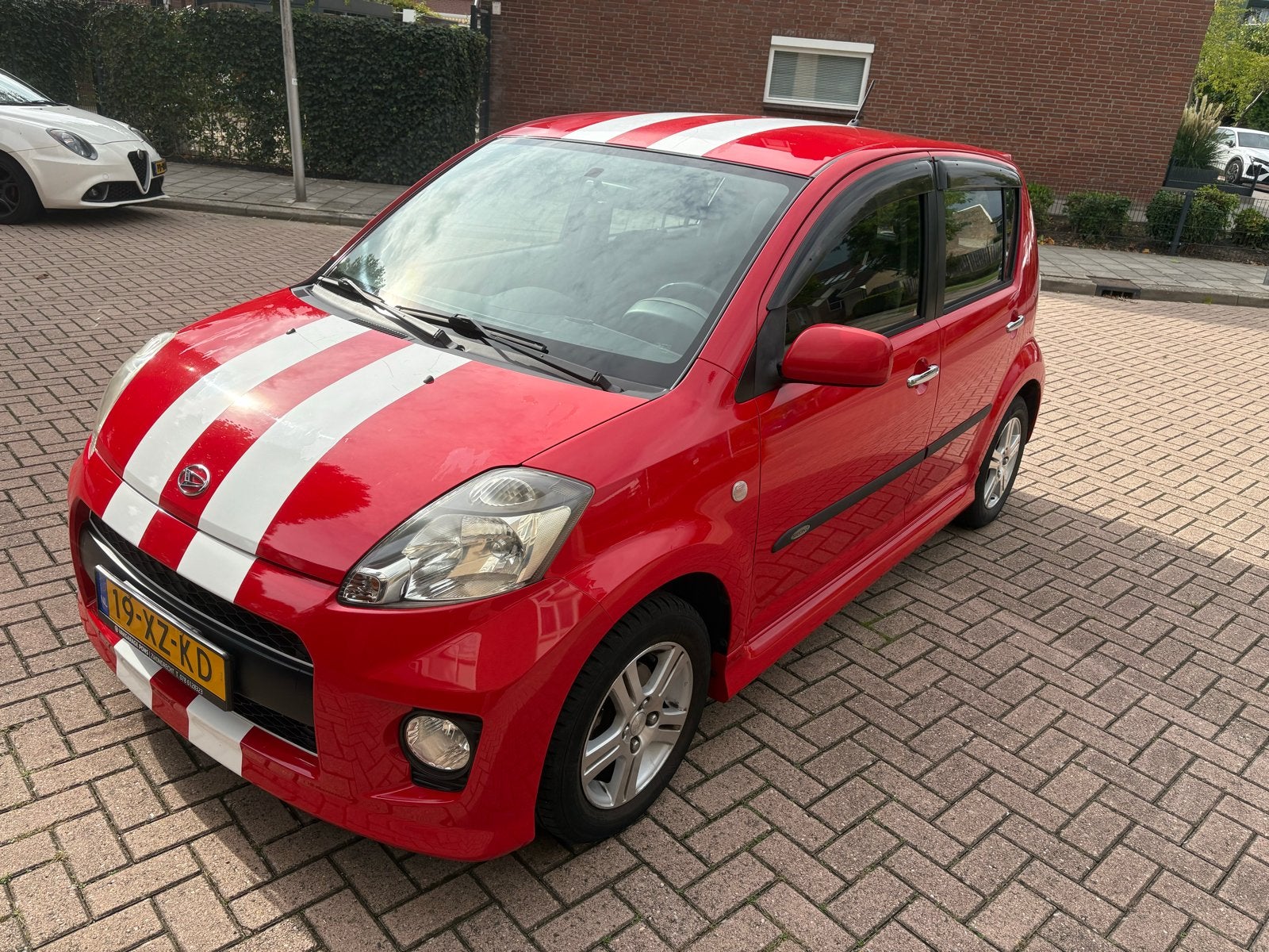 Daihatsu Sirion Sport 1.3 2007 Rood, Voorwielaandrijving, 31 €/maand, 4 cilinders, 1000 kg