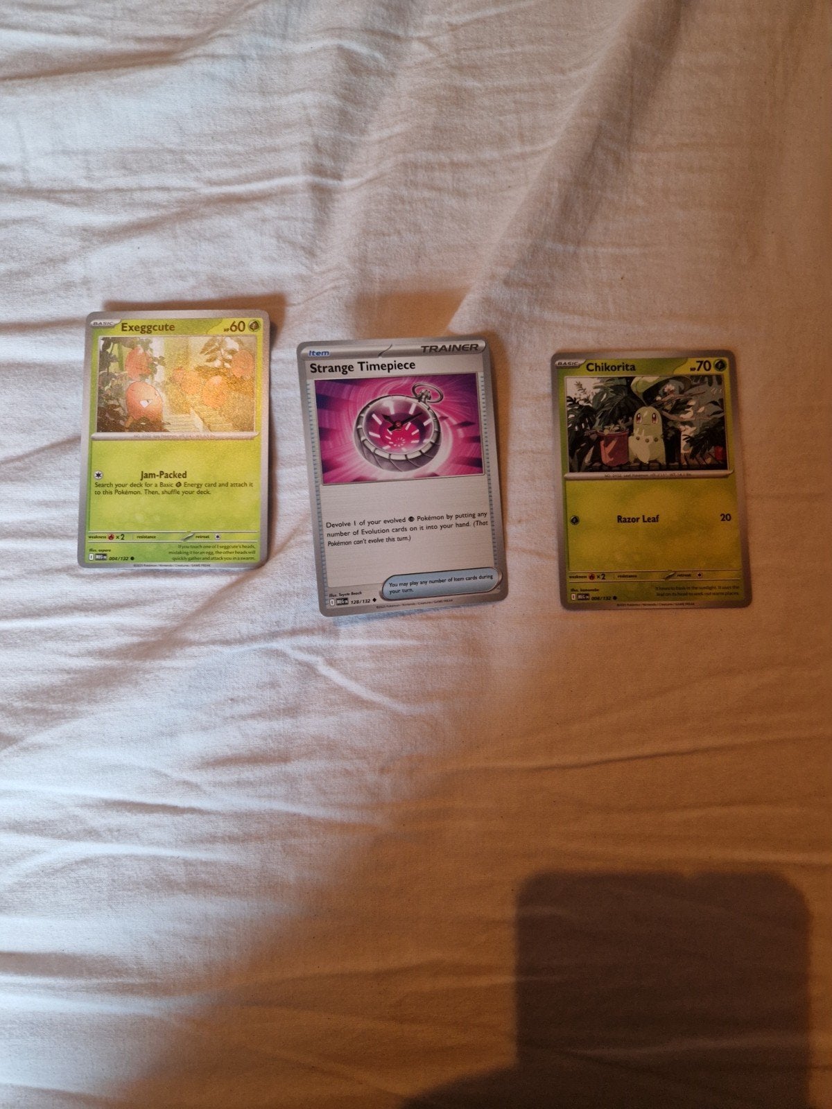 Pokémon kaarten: Exeggcute, Strange Timepiece, Chikorita, Ophalen of Verzenden, Gebruikt, Meerdere kaarten