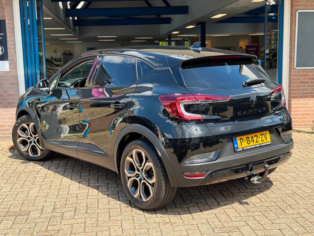 Renault Captur 1.6 E-Tech Hybrid 145 Intens AUT NAVI NAP!, Auto's, 94 pk, Stof, Gebruikt, 715 kg