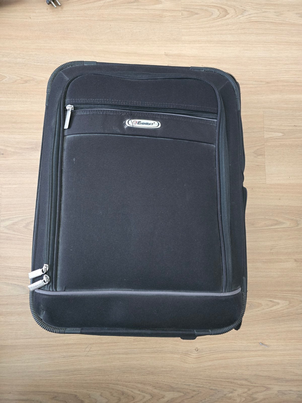Zwarte reiskoffer met wieltjes en uitschuifbare handgreep, Overige materialen, Wieltjes, Gebruikt, 50 tot 60 cm