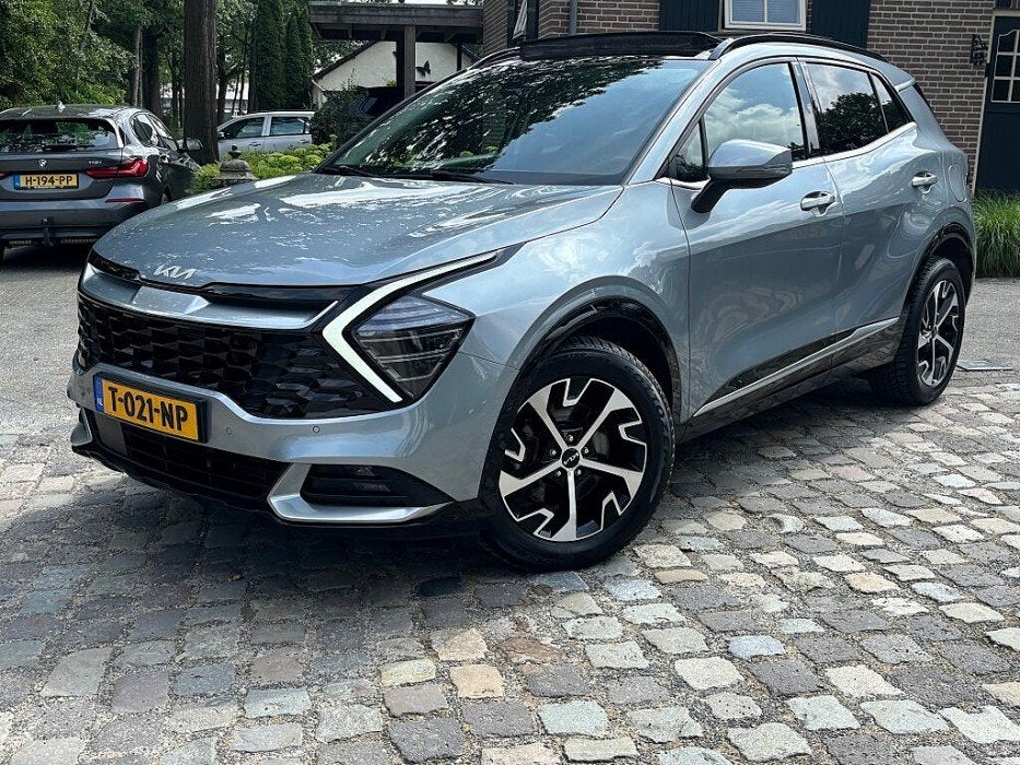 Kia Sportage 1.6 T-GDi Hybrid DynamicPlusLine,pano,1/2leer,l, Auto's, Gebruikt, 4 cilinders, 179 pk, 1650 kg