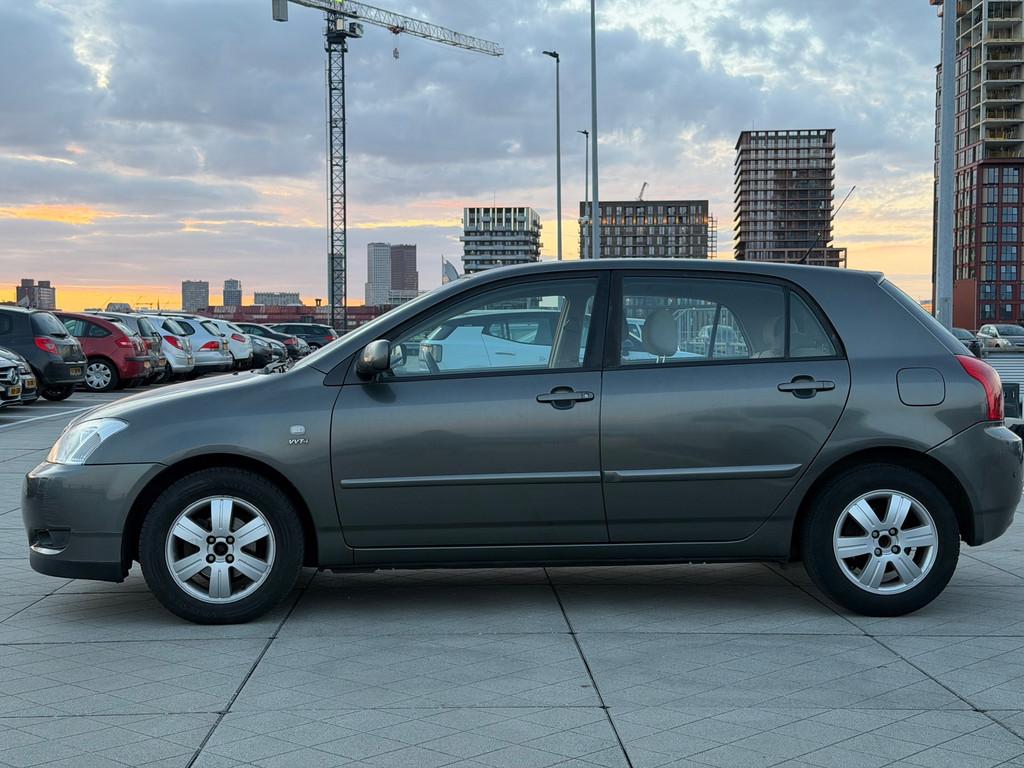 Toyota Corolla 1.6 VVT-i Linea Sol Dealer Onderhouden Automa, Auto's, Toyota, Gebruikt, Beige, 4 cilinders, Corolla