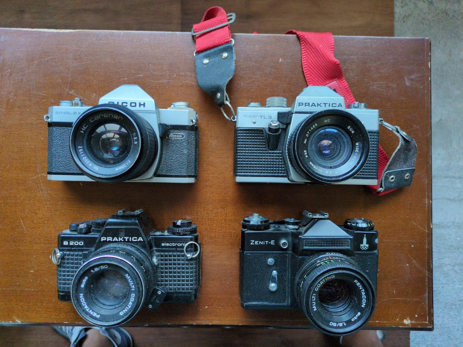 Vier Analoge Spiegelreflexcamera's - Ricoh, Praktica, Zenit, Ophalen of Verzenden, Gebruikt, Spiegelreflex, Overige Merken