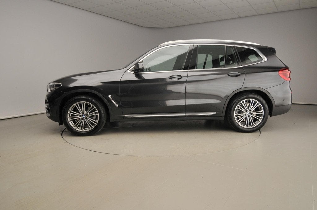 BMW X3 xDrive20i Panoramadak / Trekhaak / Sportstoelen / Par, Auto's, Automaat, 1998 cc, Stof, Gebruikt
