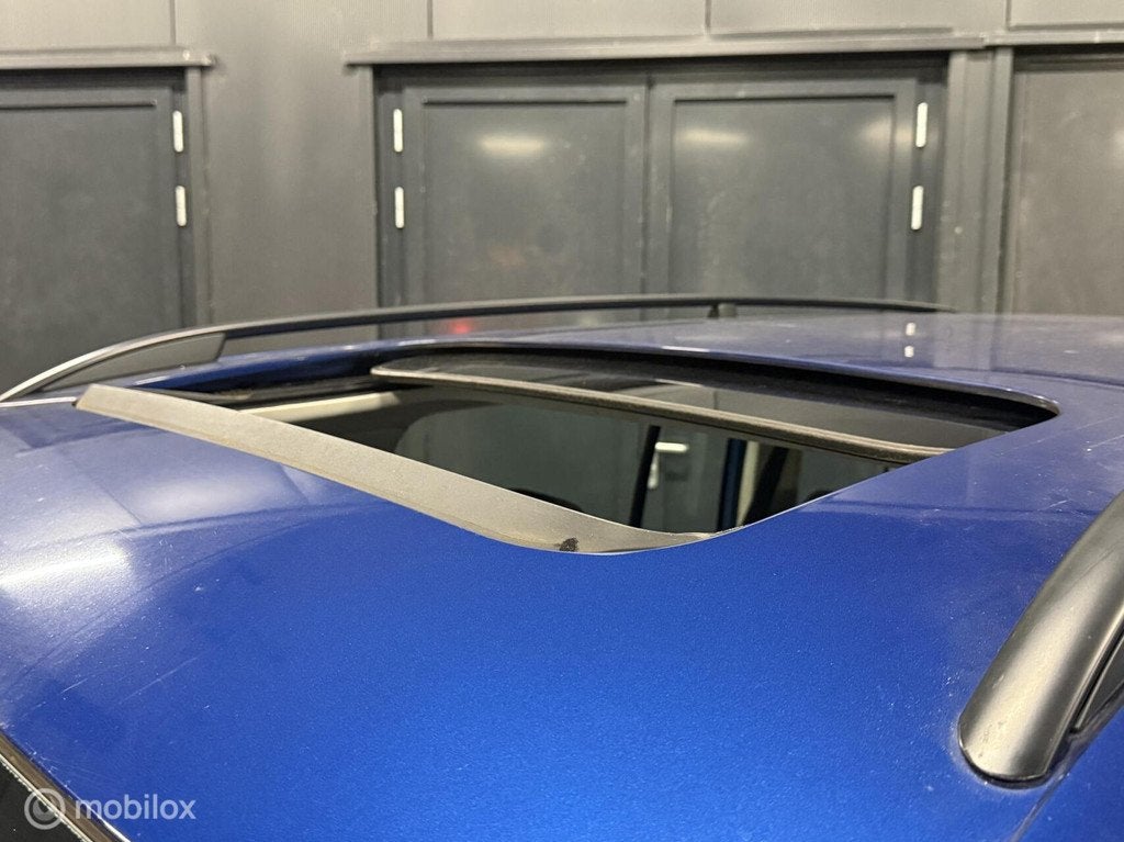 Volkswagen Touran 1.4 TSI Optive 7 pers|schuifdak|carplay, Voorwielaandrijving, Gebruikt, 4 cilinders, Blauw