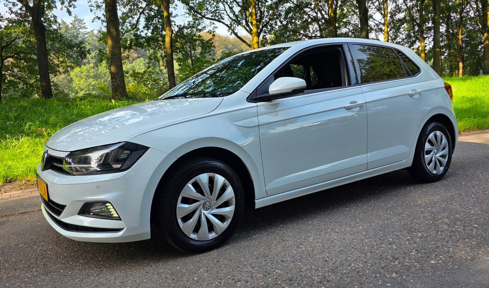 Volkswagen Polo 1.0 TSI - NL Auto - 2e Eigenaar - Navigatie, Voorwielaandrijving, Gebruikt, Euro 6, 95 pk