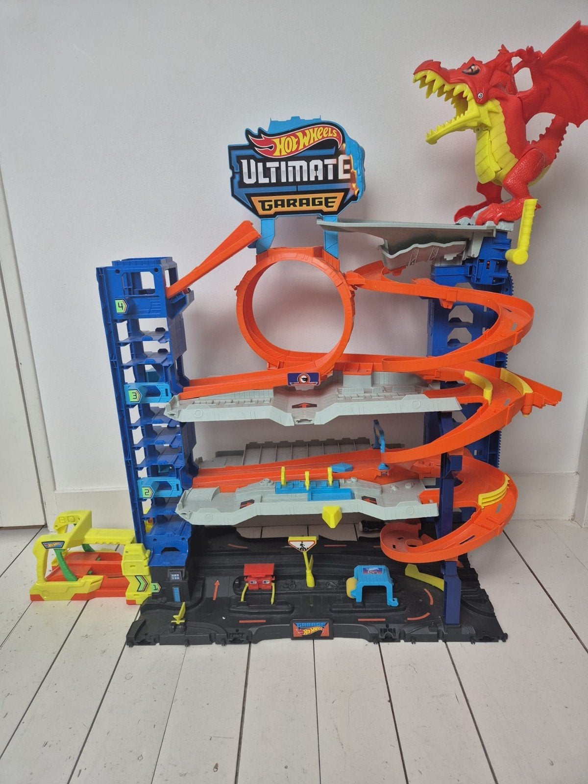 Hot Wheels Ultimate Garage + T-Rex Transporter + uitbreiding, Ophalen, Zo goed als nieuw