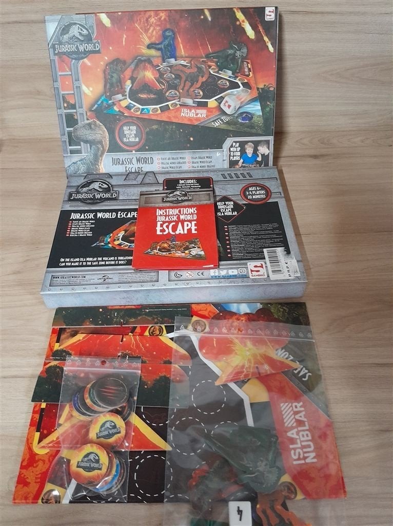 Jurassic world escape - s3287, Hobby en Vrije tijd, Gezelschapsspellen | Bordspellen, Verzenden, Zo goed als nieuw