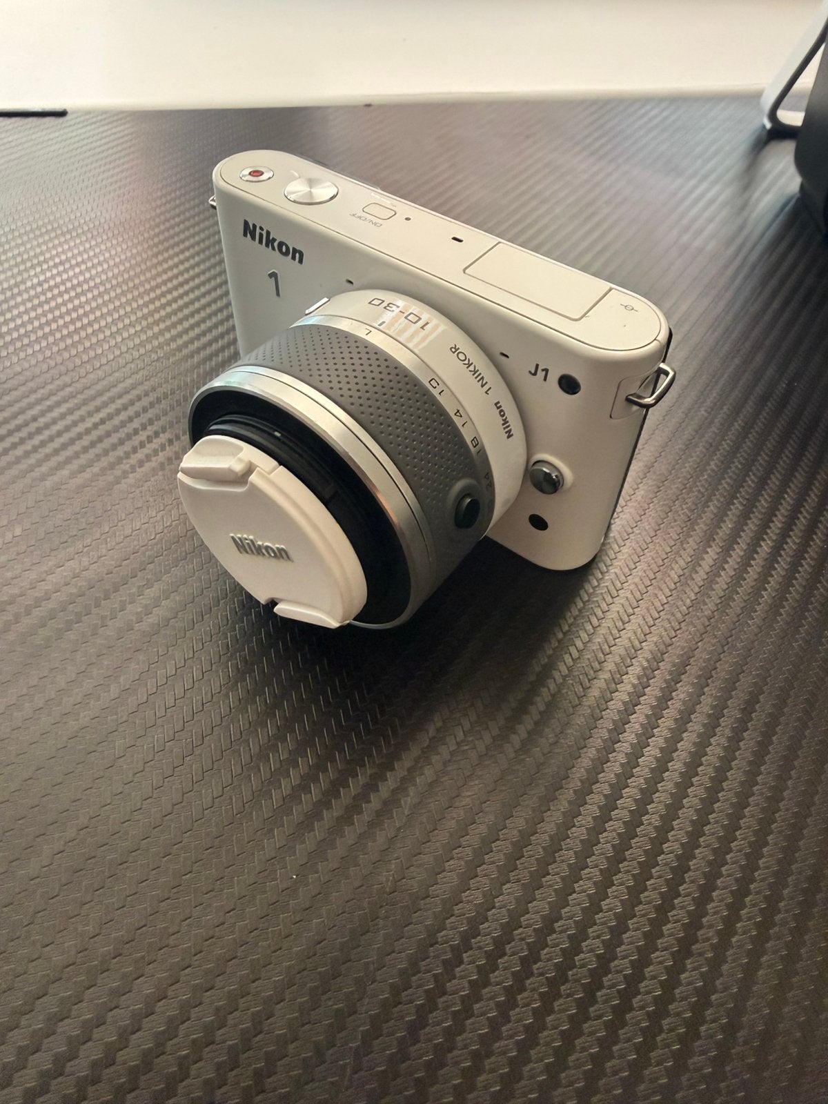 Nikon j1 weet zonder lader nooit aangezet, Ophalen, Zo goed als nieuw, Nikon, Geen optische zoom