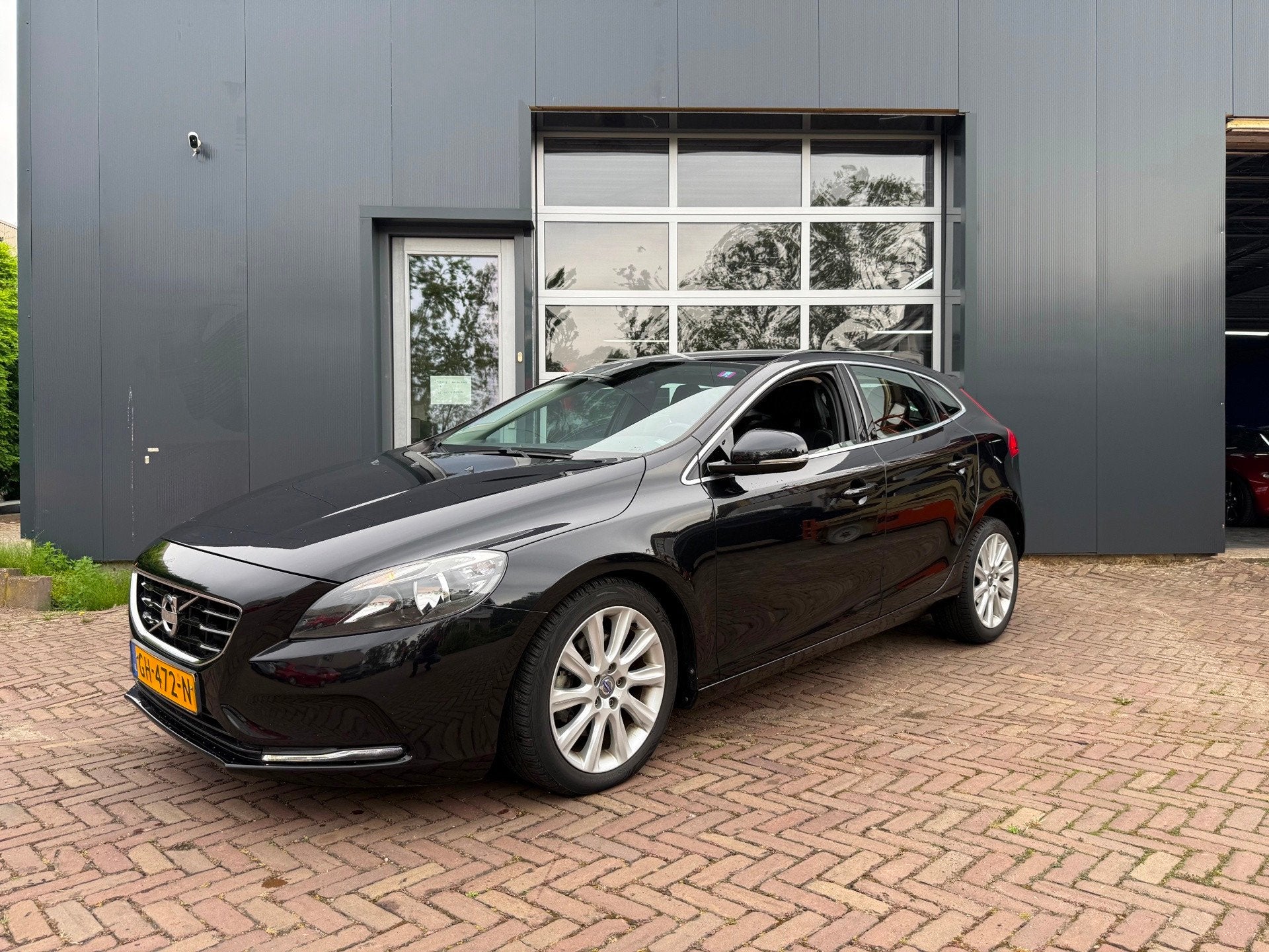 Volvo V40 1.6 T4 Momentum, Auto's, Stof, Zwart, 4 cilinders, 700 kg