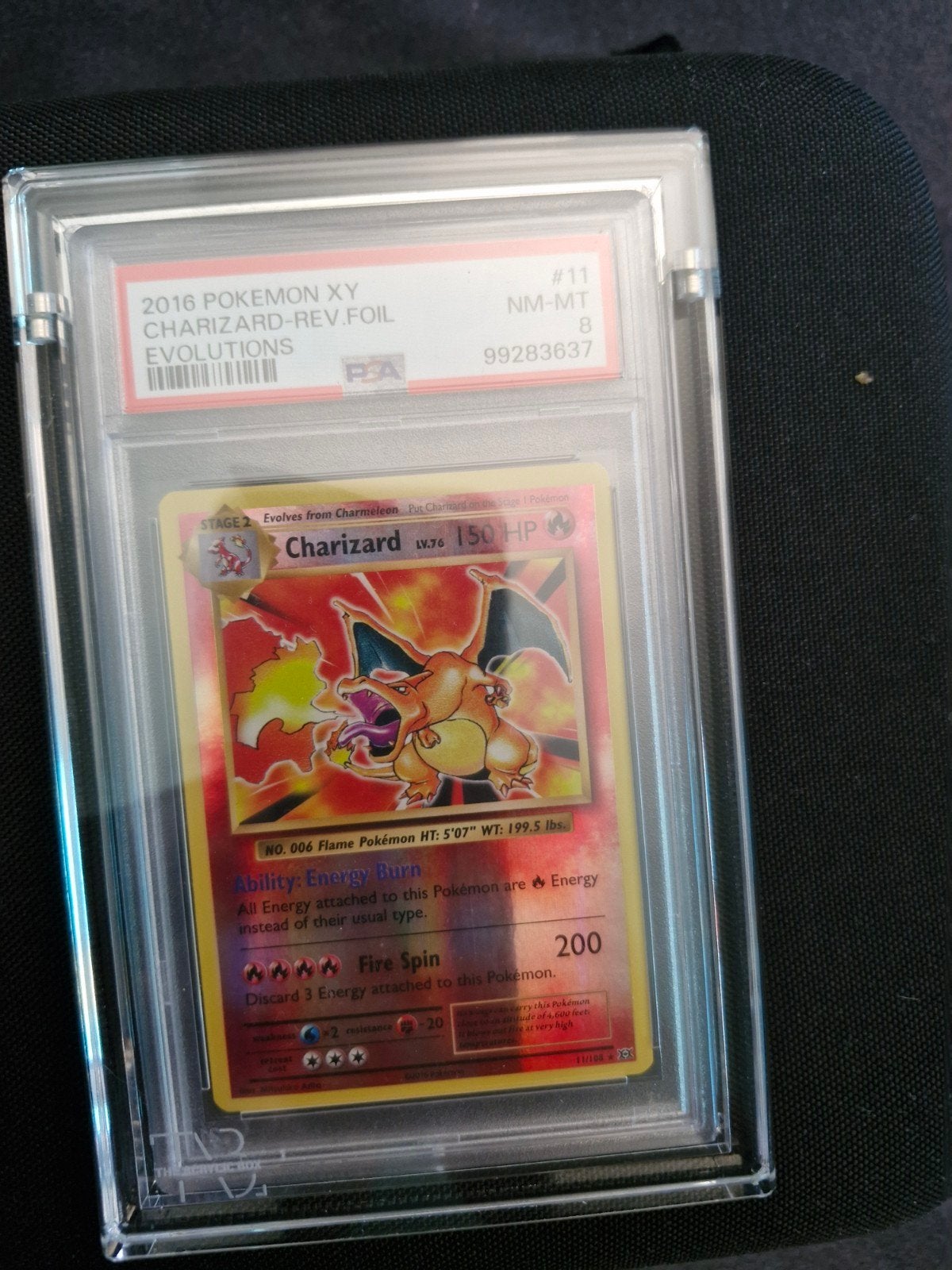 PSA 8 Charizard Reverse Foil 2016 XY Evolutions, Hobby en Vrije tijd, Verzamelkaartspellen | Pokémon, Ophalen of Verzenden, Zo goed als nieuw