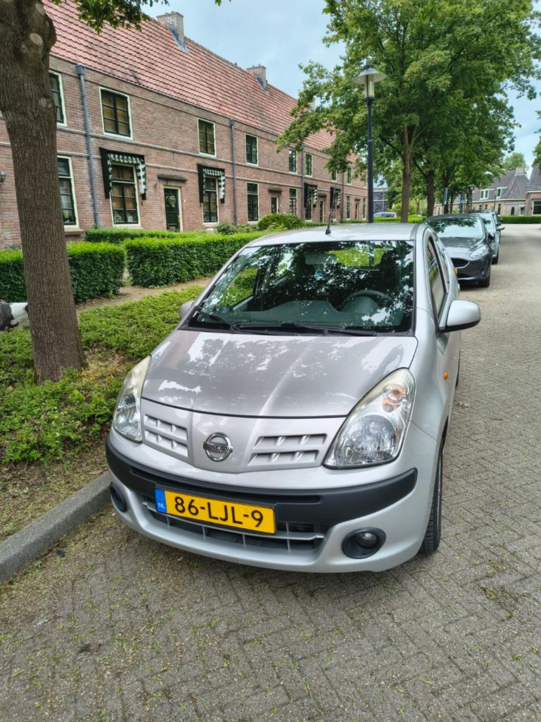Nissan pixo dealer onderhouden km stand 146000, Voorwielaandrijving, Stof, Zwart, 68 pk