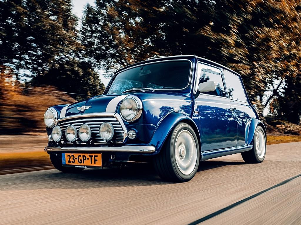 Mini Cooper 1.3 MPi 1998 Blauw, Auto's, Voorwielaandrijving, 63 pk, Zwart, Blauw