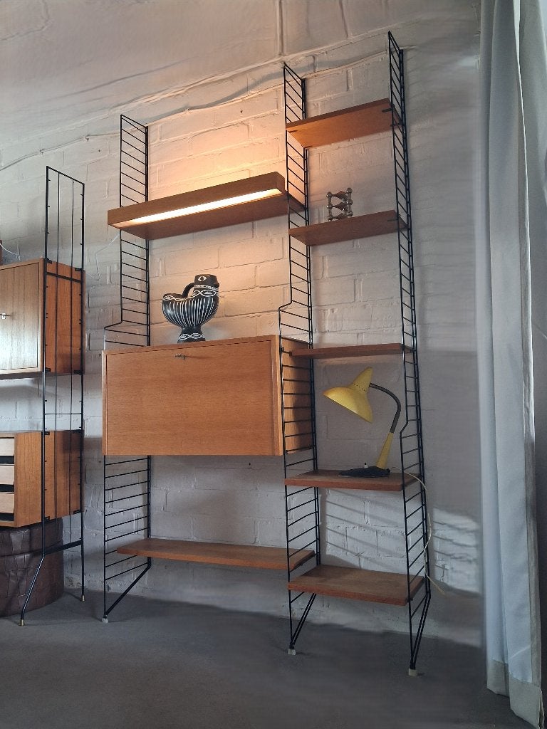 Nisse String wandmeubel met secretaire en verlichting, eiken, Ophalen, Gebruikt, 200 cm of meer, Minder dan 150 cm