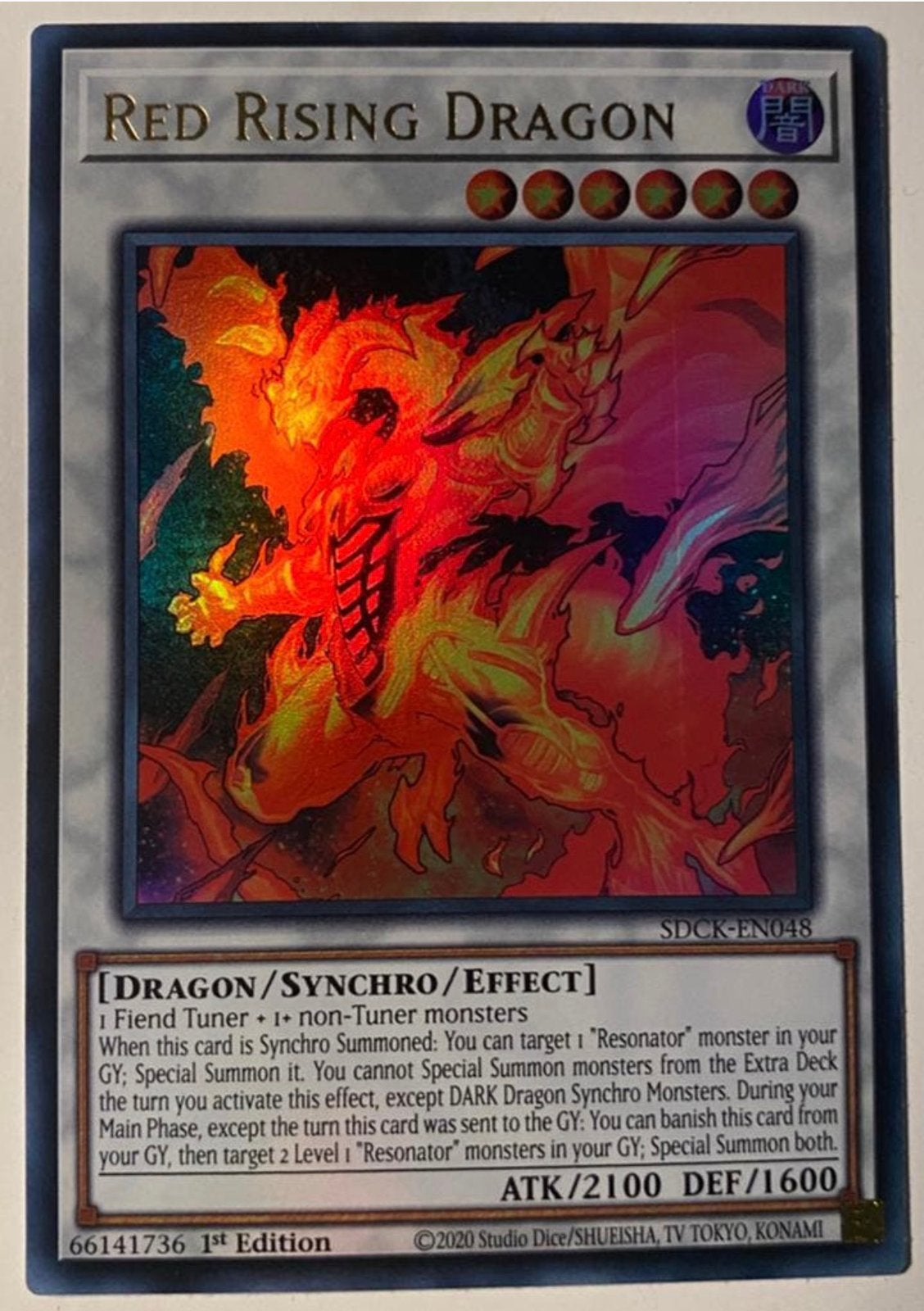 Yu-Gi-Oh! Red Rising Dragon SDCK 1st Edition !, Ophalen of Verzenden, Zo goed als nieuw, Losse kaart, Foil