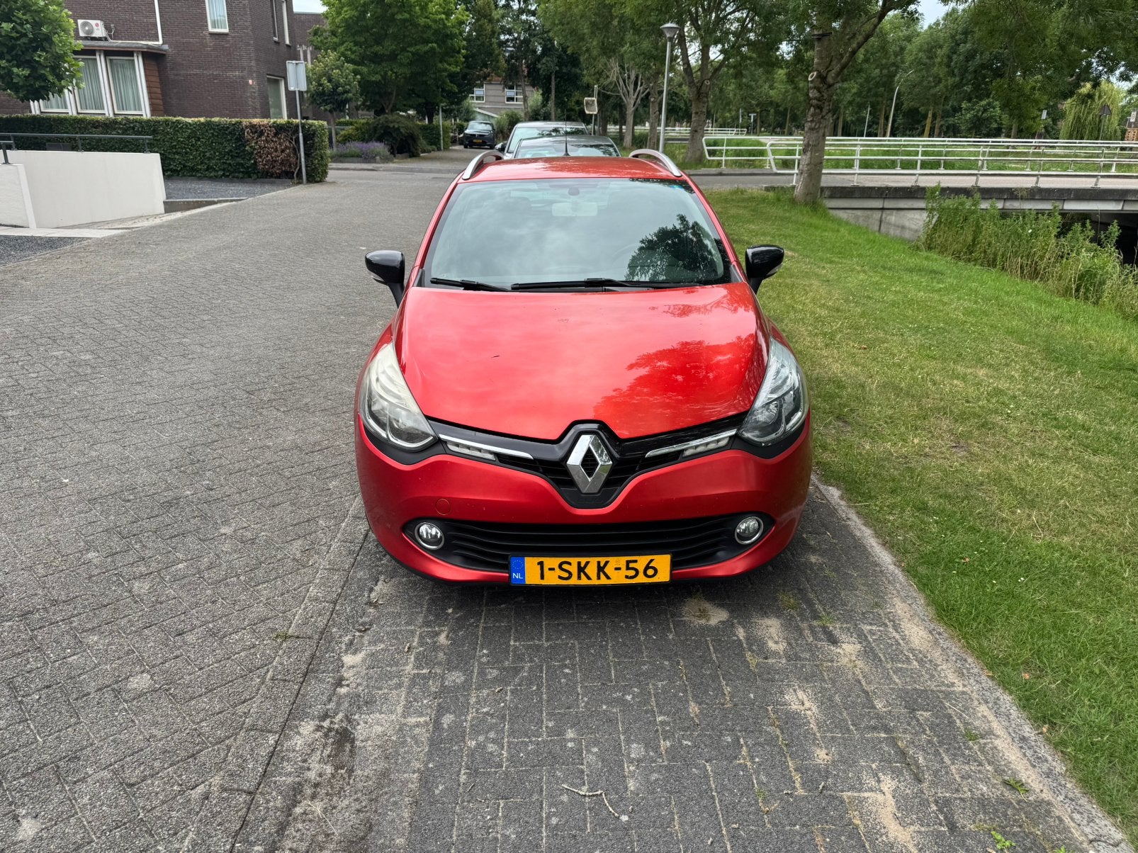 Renault Clio Energy TCe 90pk S&S 2013 Rood, Auto's, Voorwielaandrijving, 898 cc, Origineel Nederlands, Handgeschakeld