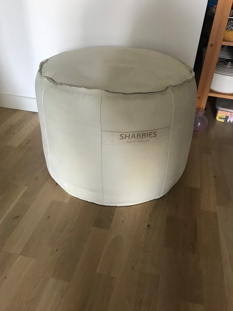 Lederen ronde poef van  Shabbies (Fred de la Bretoniere), Ophalen, Leer, Zo goed als nieuw, 50 tot 75 cm
