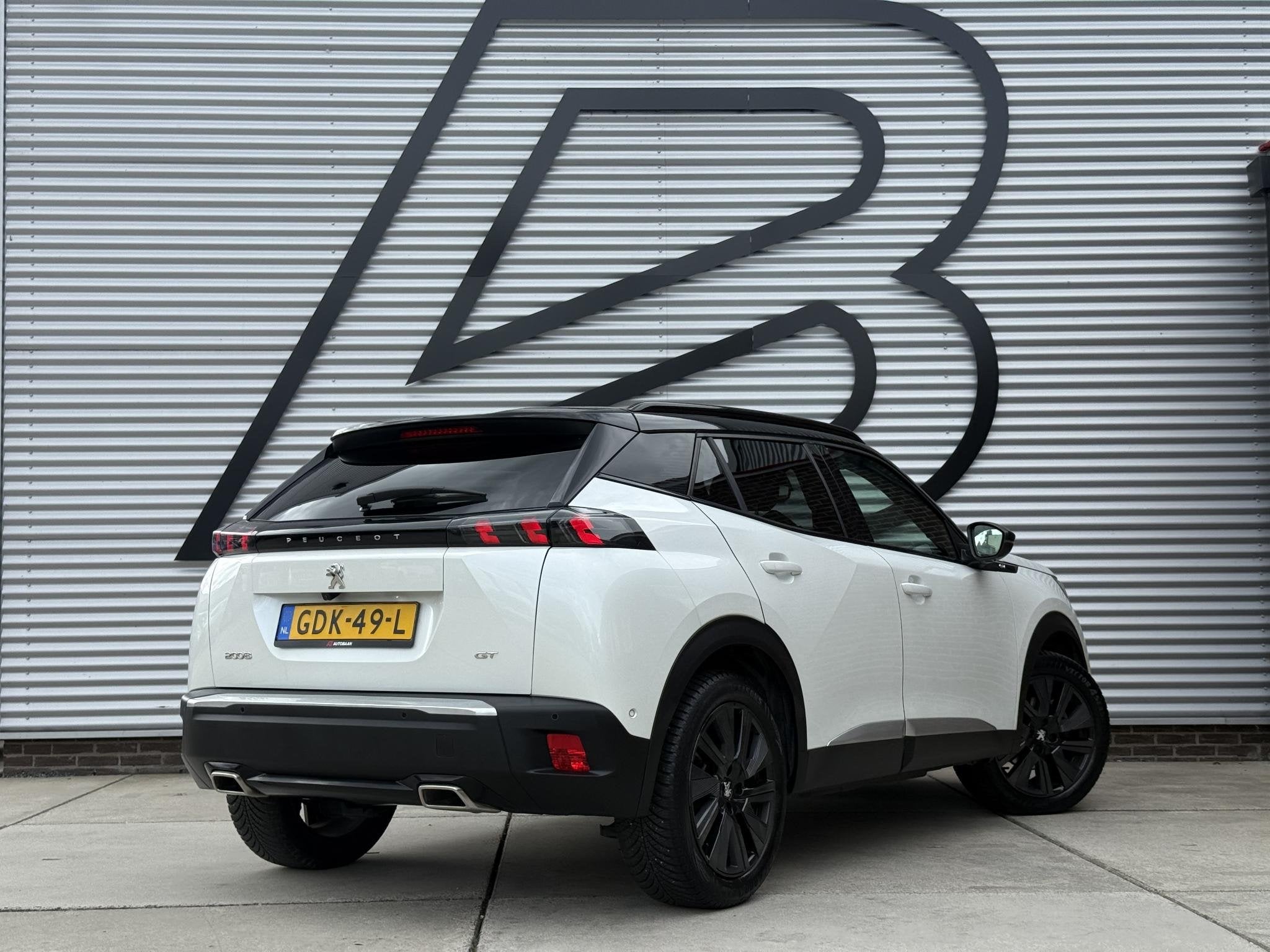 Peugeot 2008 1.2 PureTech GT 1e Eigenaar|Pano|Carplay|i-Cock, Auto's, Gebruikt, Euro 6, Wit, Leder