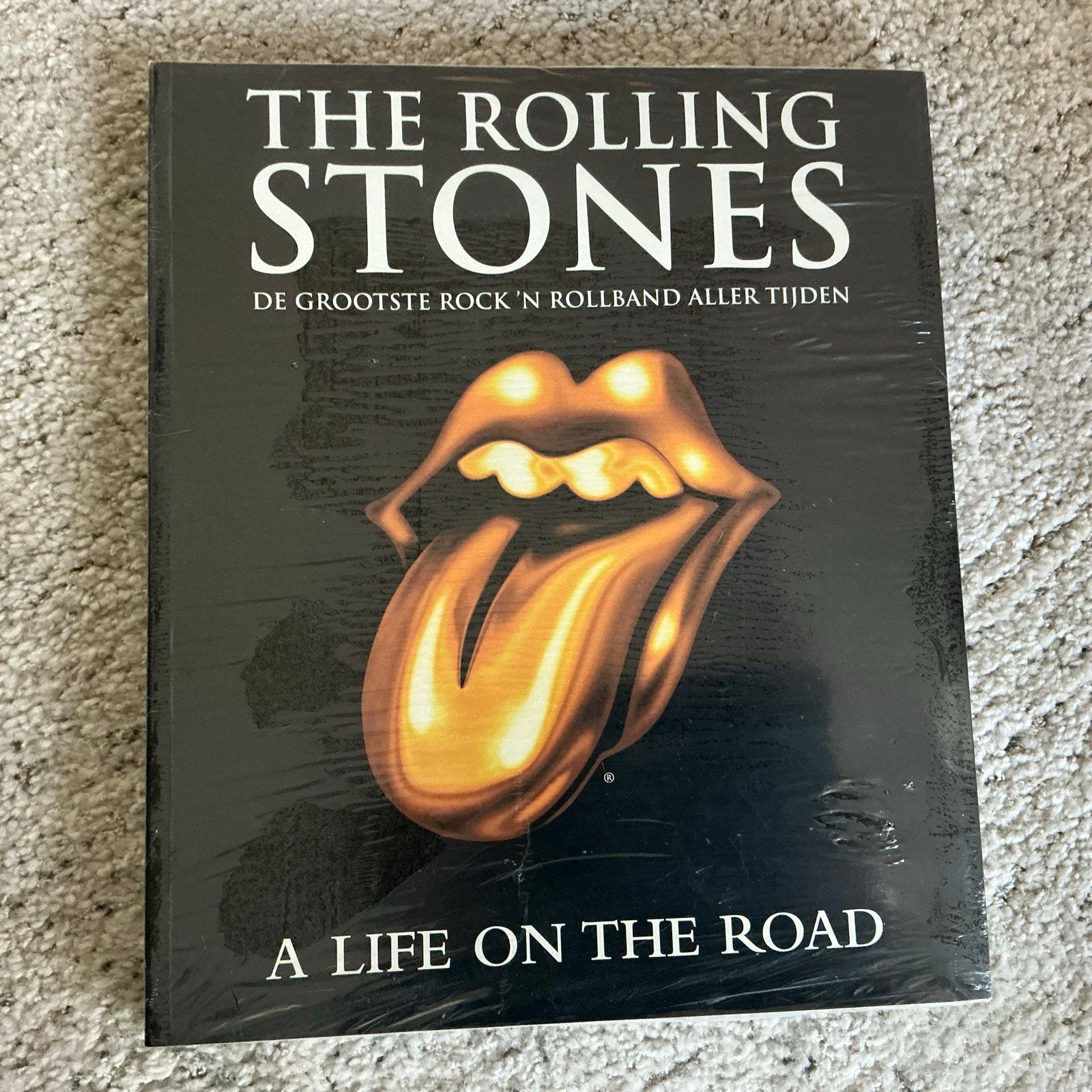 The Rolling Stones: A Life on the Road - Boek, Ophalen of Verzenden, Nieuw, Artiest