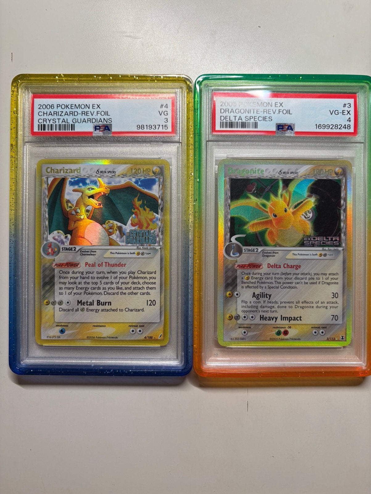 Charizard en dragonite PSA Delta species, Ophalen of Verzenden, Nieuw, Losse kaart, Foil