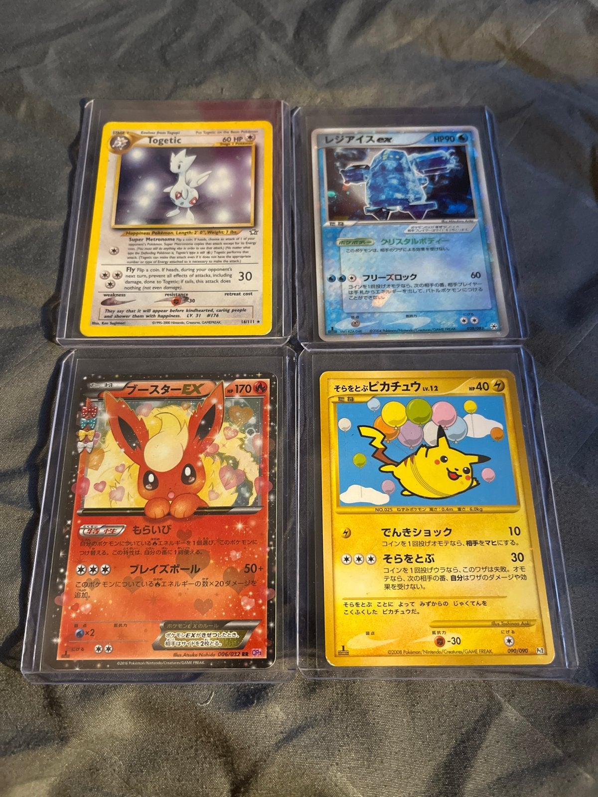 4 Pokémon kaarten - Togetic (swirl holo), Regice ex, Flareon, Ophalen of Verzenden, Zo goed als nieuw, Meerdere kaarten, Foil