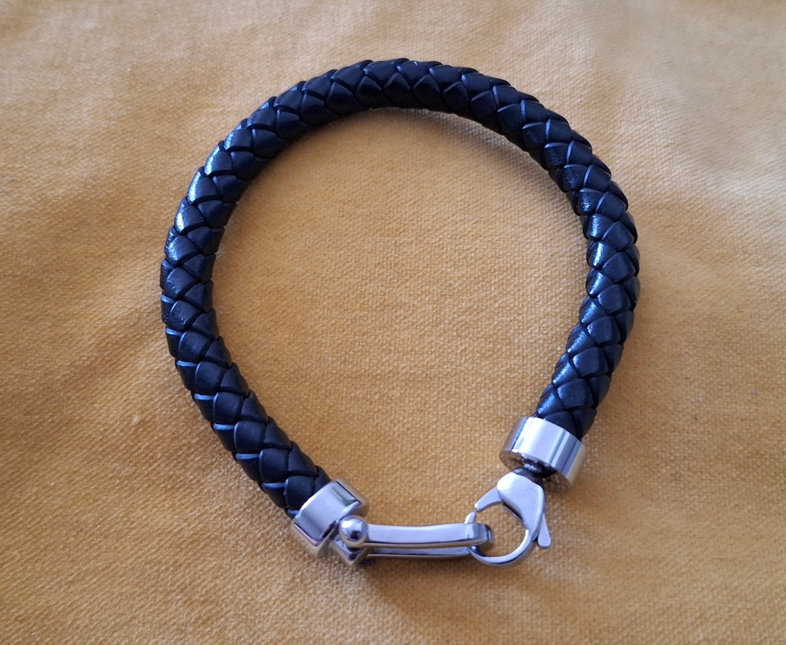 Gevlochten leren armband met stalen sluiting, Ophalen, Zo goed als nieuw, Zwart, Leer