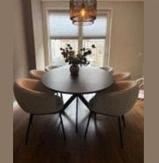 Mooie zwarte ovale eettafel met spinpoot + 6 witte stoelen, Ophalen, Gebruikt, 100 tot 150 cm, Vijf personen of meer