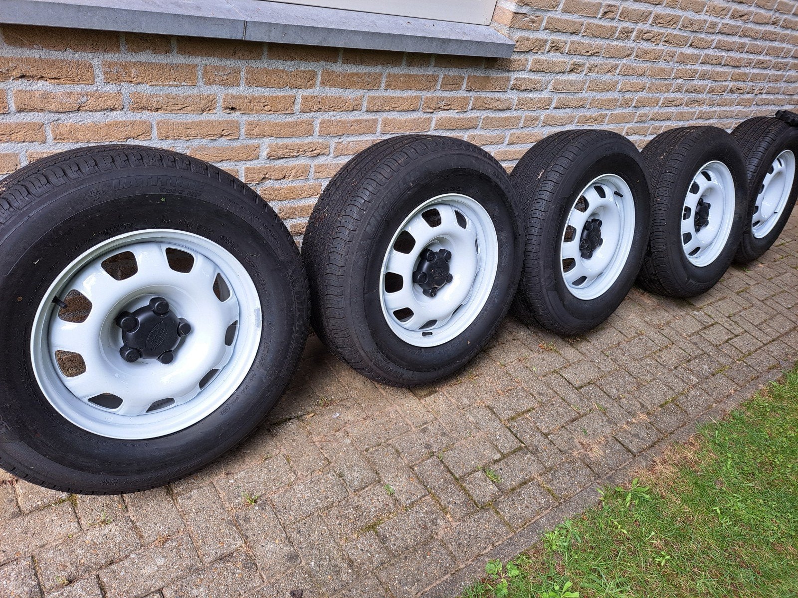 Band en velg Landrover defender L663 origineel., Ophalen of Verzenden